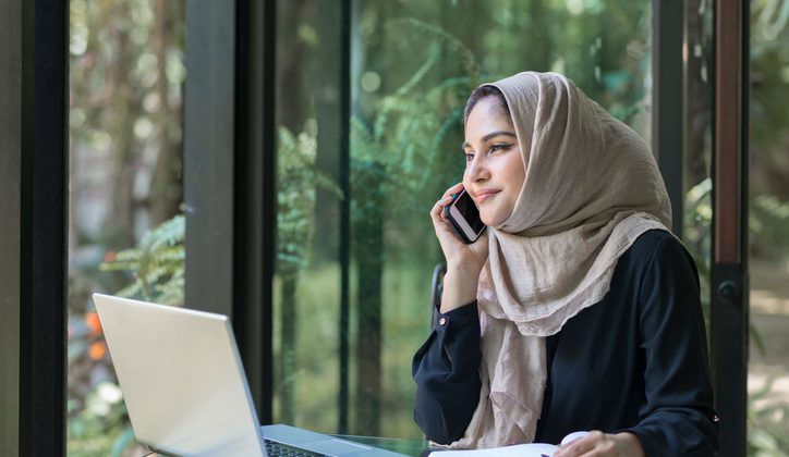 A student calling from UK to her home country Pakistan