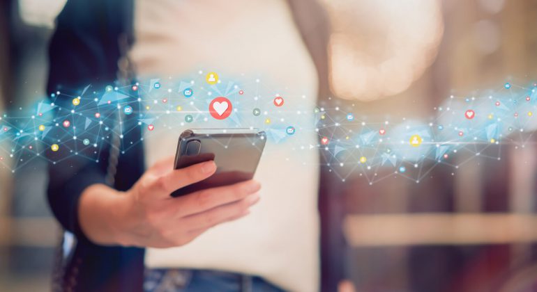 Social media and digital online concept, woman using smartphone checking internet download speed uk