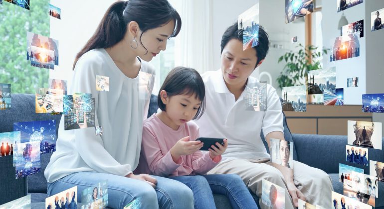 parents watching youtube with child after setting up parental controls on youtube
