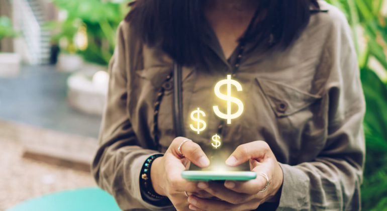 woman using smartphone and reading how to Avoid data overage charges