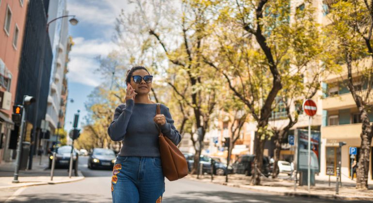 a women asking on a call that how to call Portugal